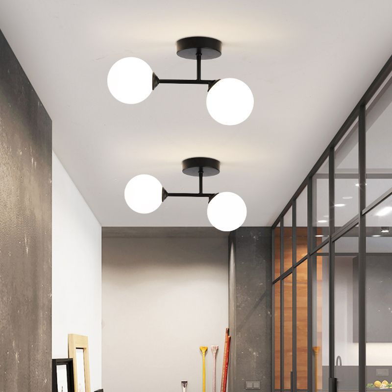 Black Valentina ceiling lights with globe glass shades
