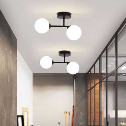 Black Valentina ceiling lights with globe glass shades