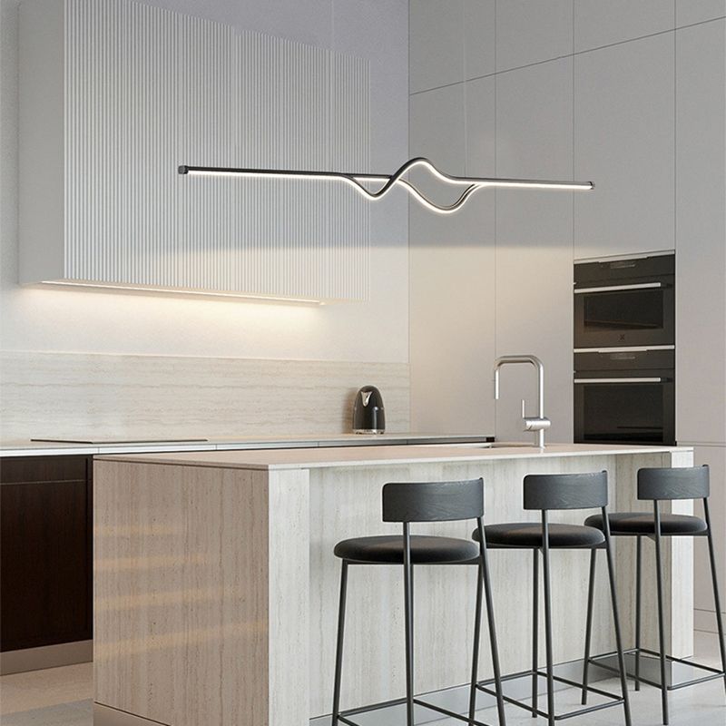 Modern linear pendant light over kitchen island