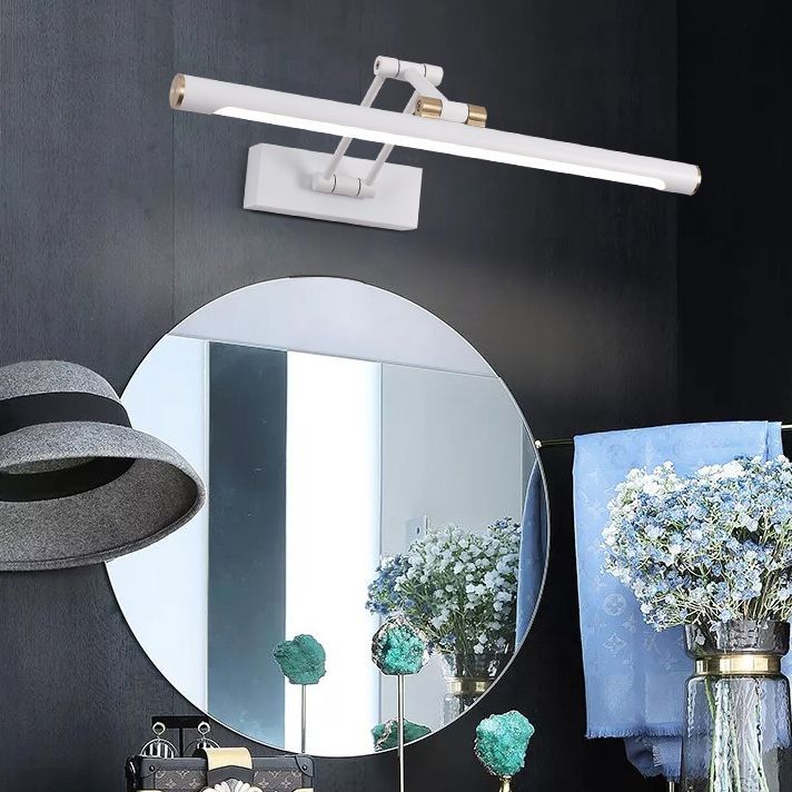 White adjustable LED vanity light above bathroom mirror
