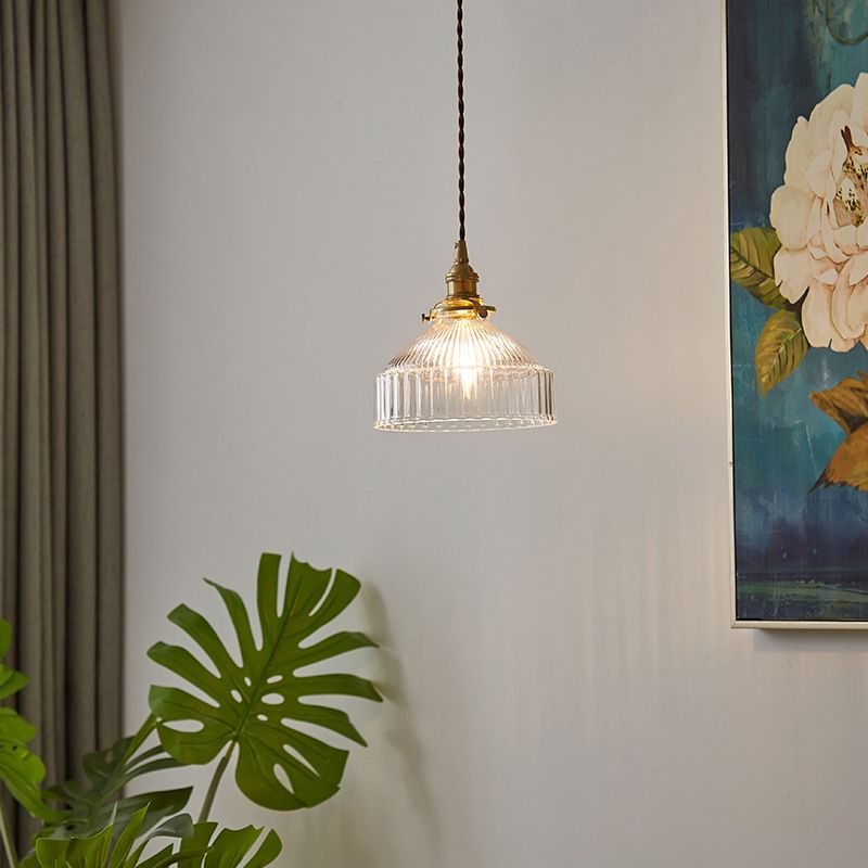 Vintage glass pendant light in dining room setting