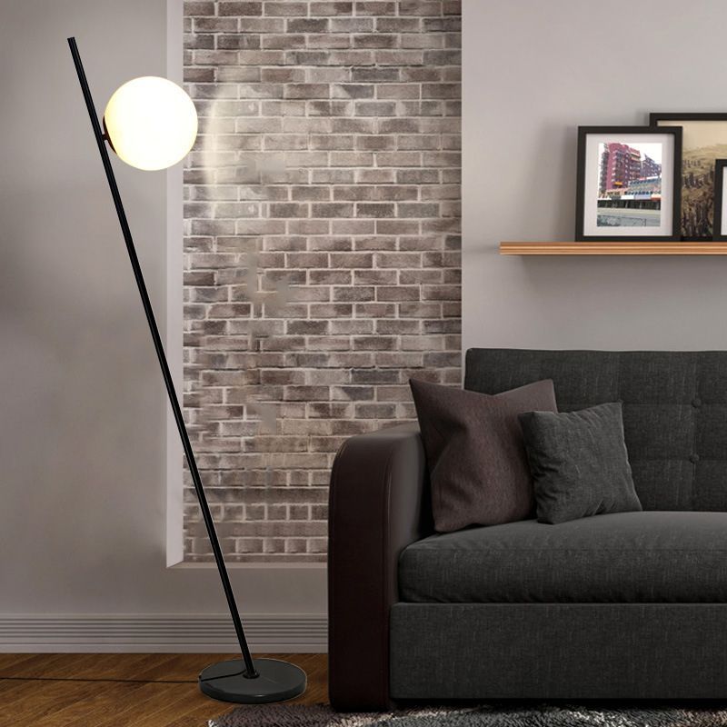 Valentina Floor Lamp in Living Room with black metal and orb shade