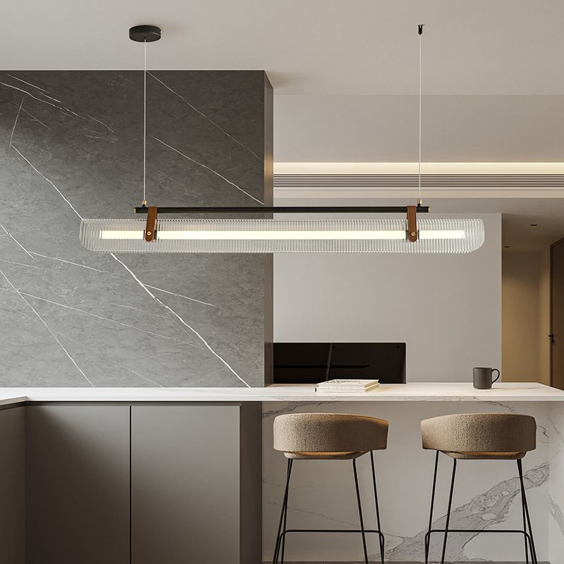 Modern linear Edge pendant light above kitchen island