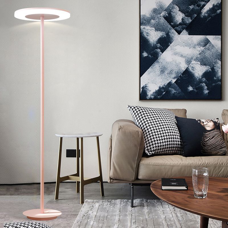 Pink disc floor lamp in living room, Las Sola lighting