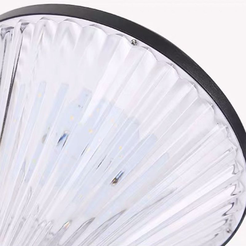 Close-up of Riley outdoor pillar light's acrylic shade and LED lights