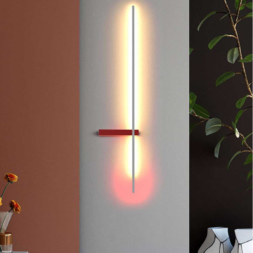 Minimalist linear wall lamp illuminating a modern interior