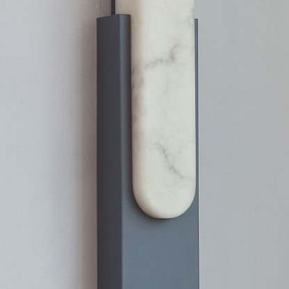 Close-up of Chan Wall Lamp detail, stone and metal