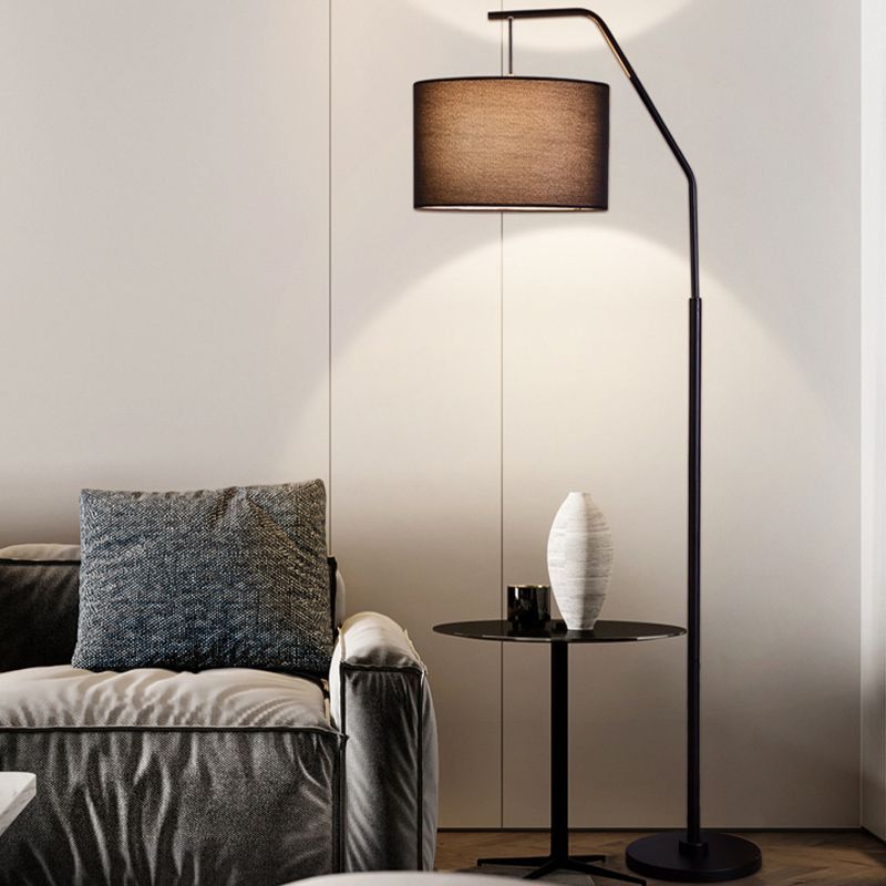 Eryn cylinder floor lamp, black metal frame, fabric shade.