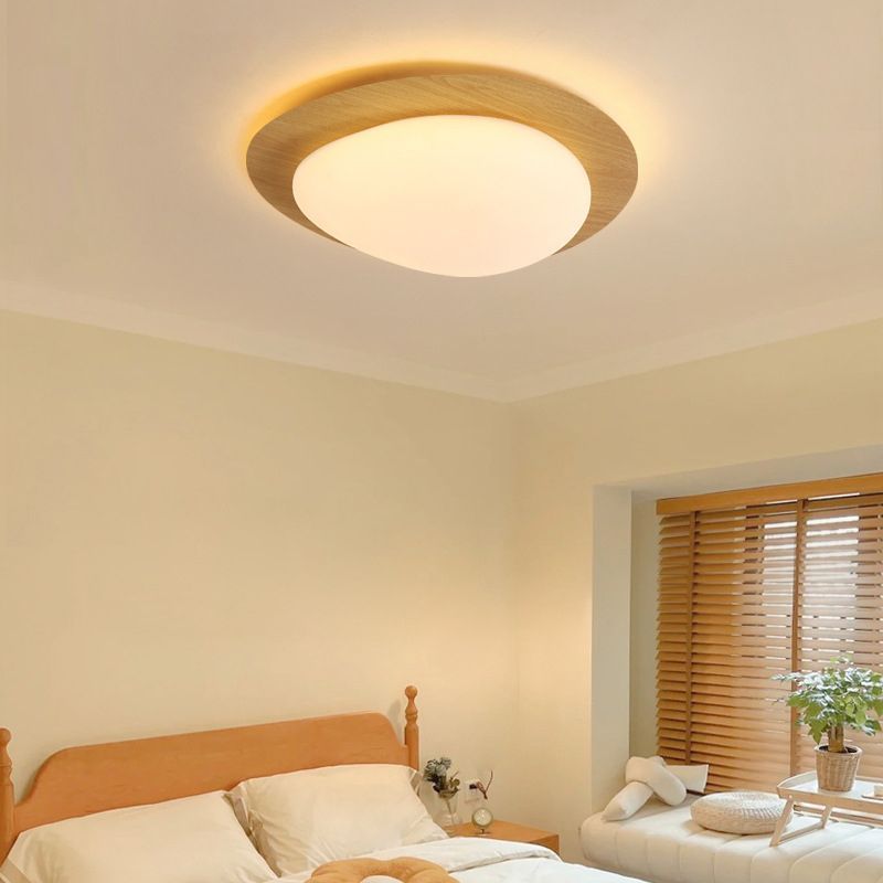 Modern Quinn ceiling light in bedroom, warm lighting fixture