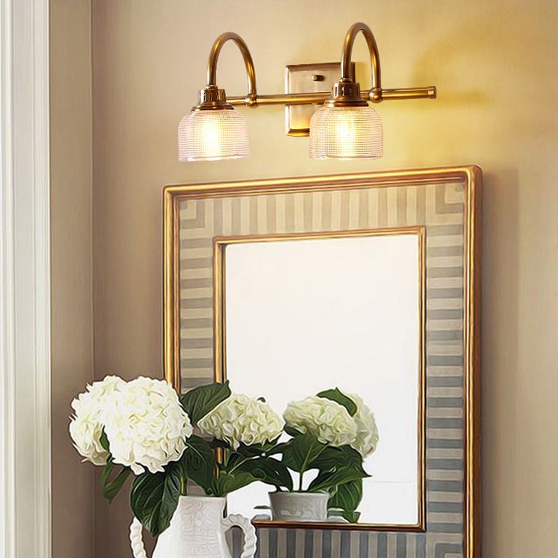 Lottie Prismatic Glass Vanity Wall Lamp above a bathroom mirror