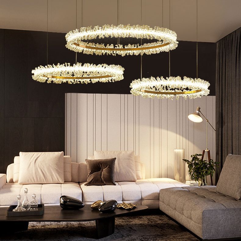 Luxury crystal ring pendant lights in a living room