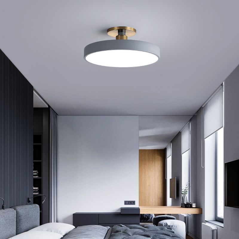 Nordic minimalist ceiling light in modern bedroom.