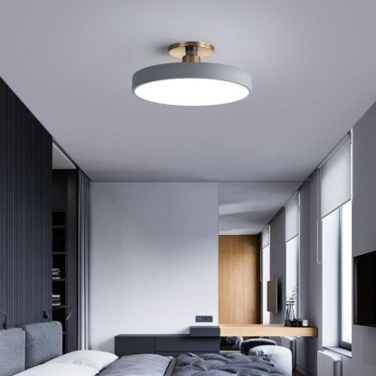 Nordic minimalist ceiling light in modern bedroom.