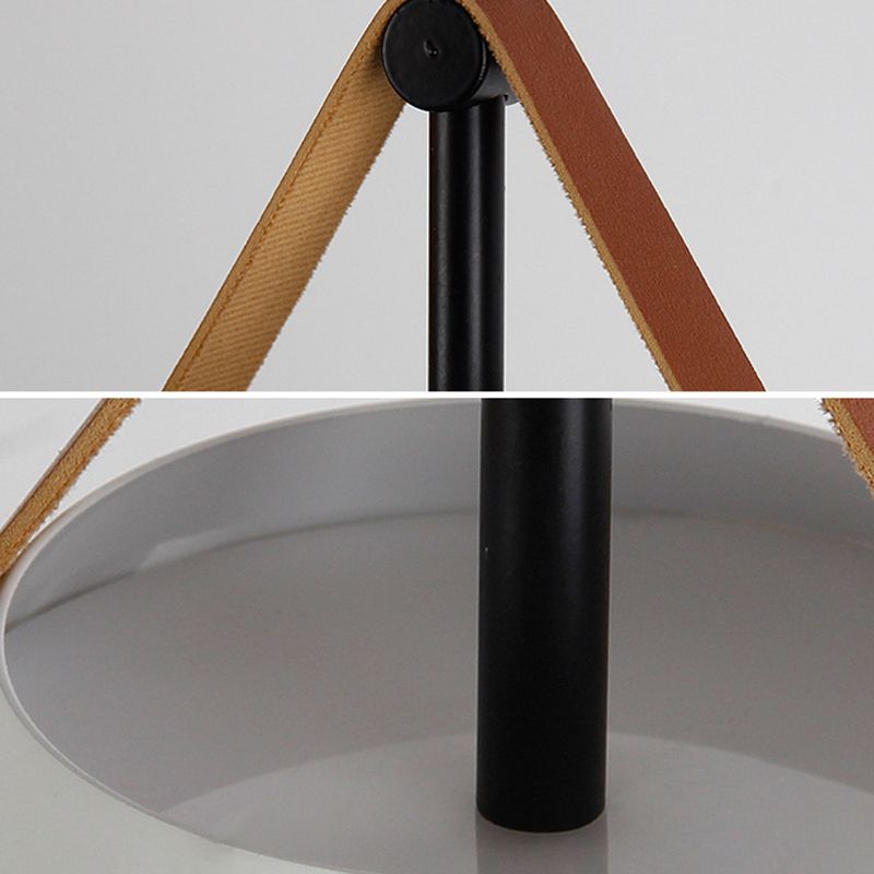 Morandi pendant light detail: leather strap and metal fixture