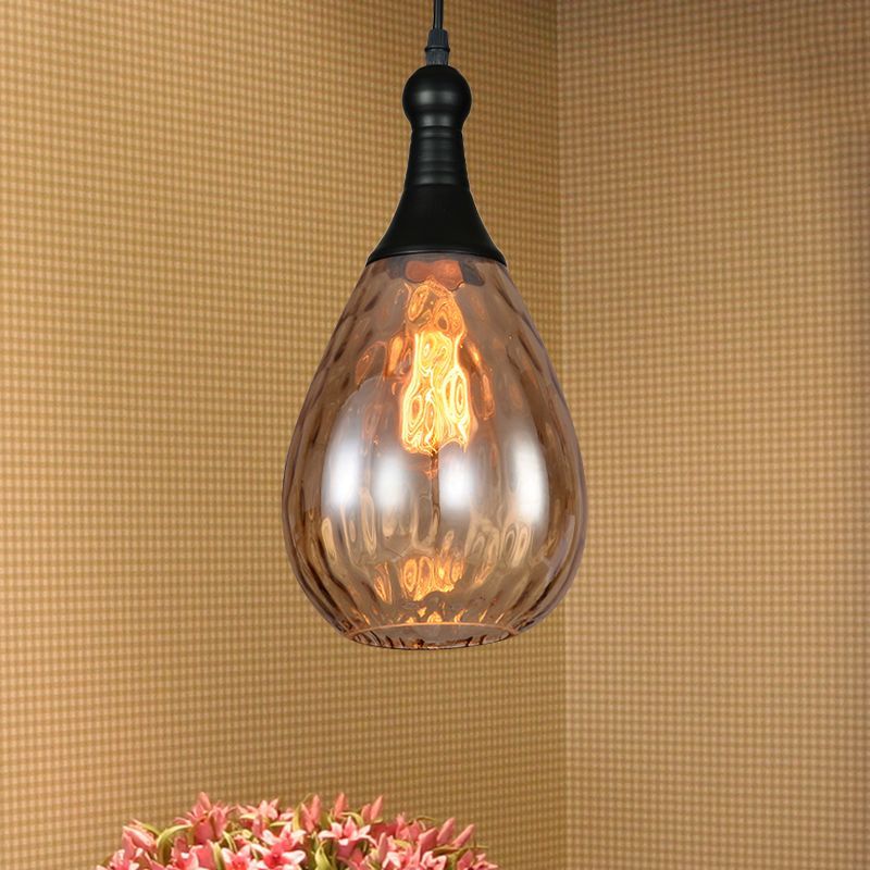 Brass Amber teardrop pendant light. Las Sola home lighting.