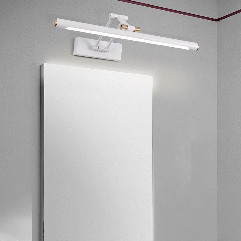 Modern white LED vanity light illuminates bathroom mirror