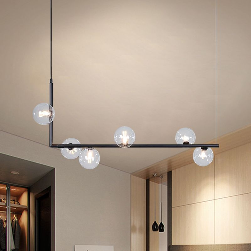 Minimalist Valentina pendant light with globe bulbs, bedroom lighting