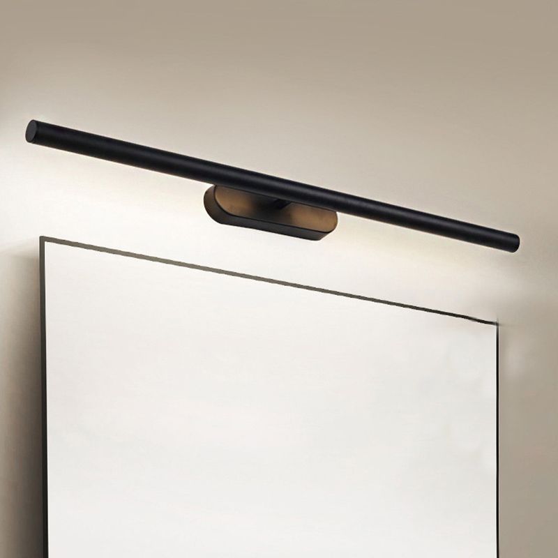 Black minimalist vanity wall lamp above mirror