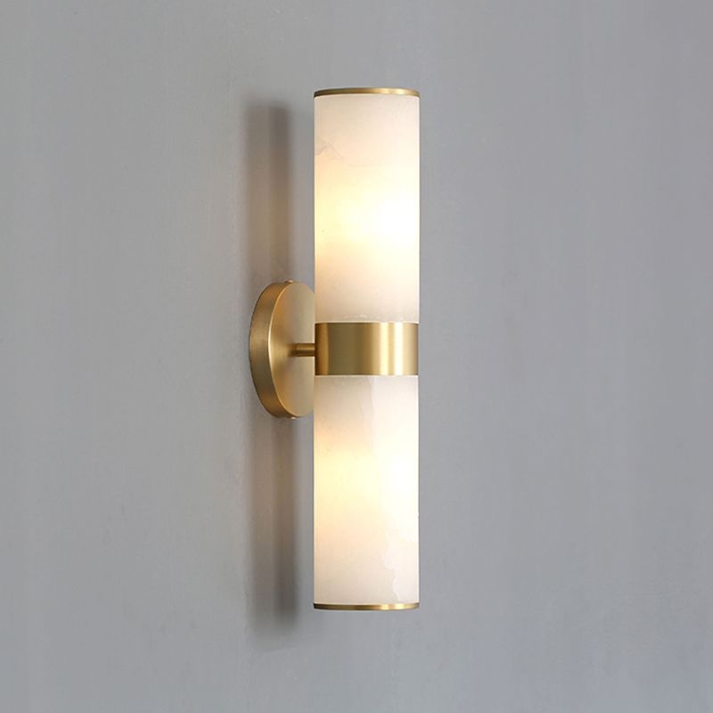 Modern brass and stone wall sconce, double-headed design