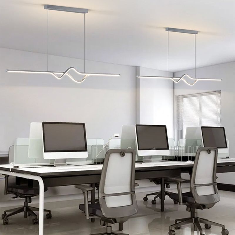 Modern office with linear pendant lighting