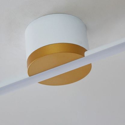 Edge linear ceiling light, gold accent. Las Sola flush mount lighting.