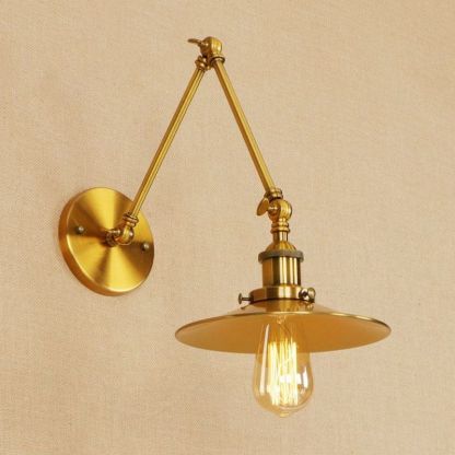 Brass Alessio adjustable wall lamp, bedroom lighting.