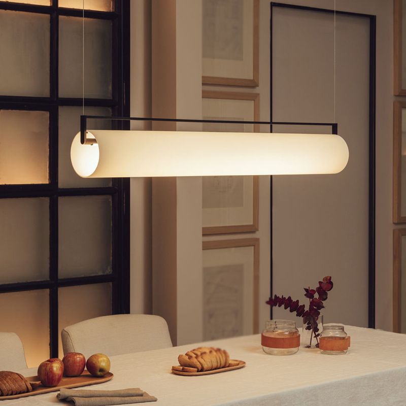 Edge Cylindrical Pendant Light over dining table setting