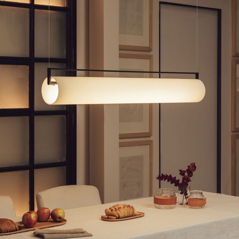 Edge Cylindrical Pendant Light over dining table setting