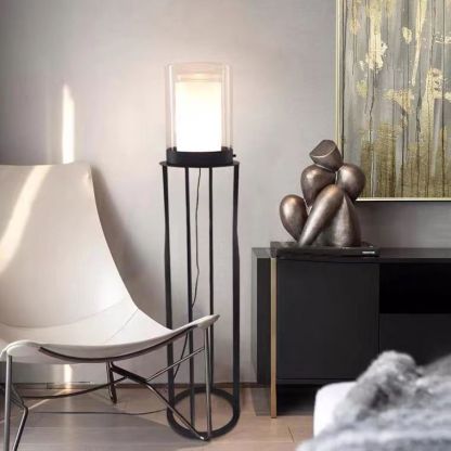 Eryn cylinder floor lamp with LED, glass and metal design.