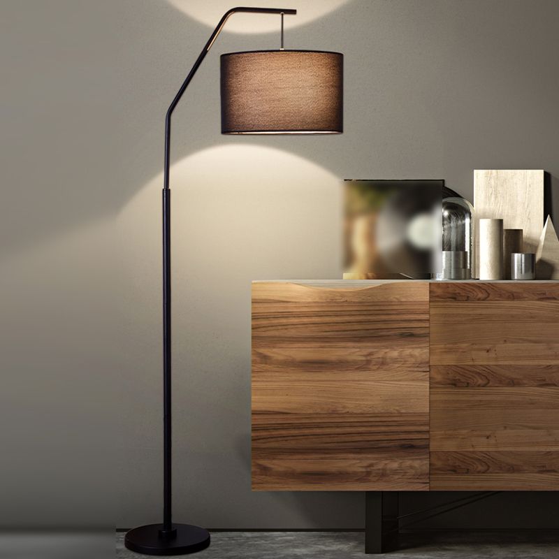 Eryn cylindrical floor lamp: black metal and fabric.