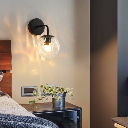 Valentina Vanity LED Wall Lamp illuminating bedroom interior