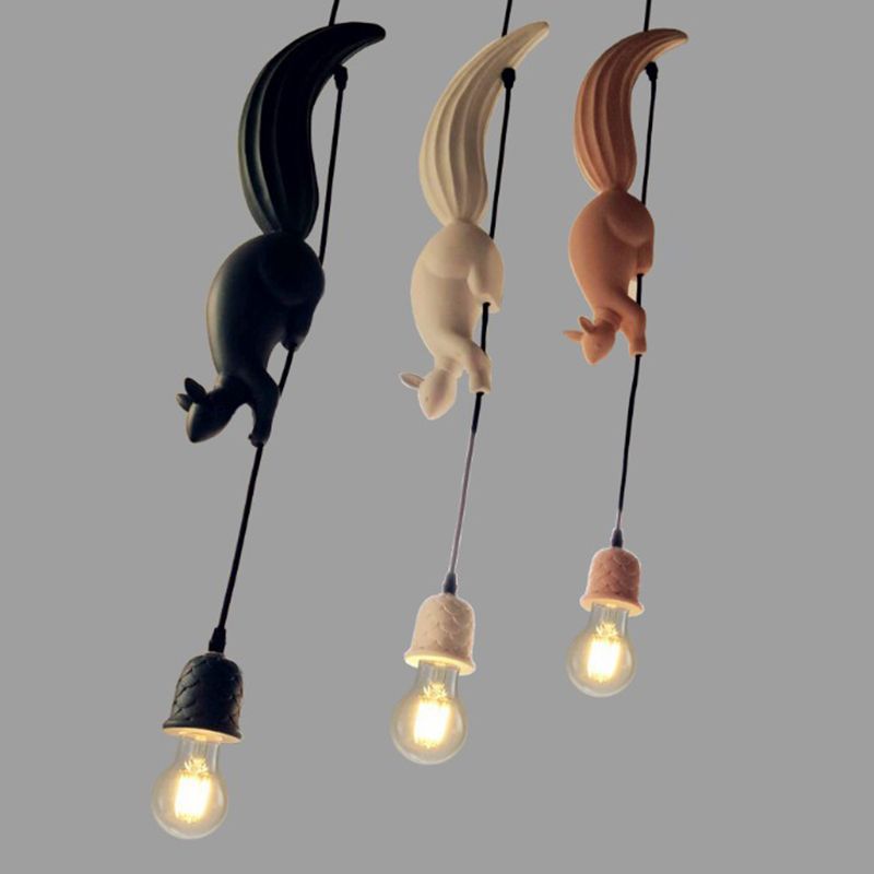 Squirrel pendant lights in black, white, and brown