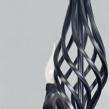 Black metal pendant light detail, candle-shaped bulb