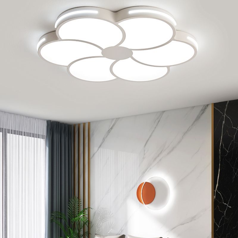 Flower-shaped ceiling light in modern living room setting