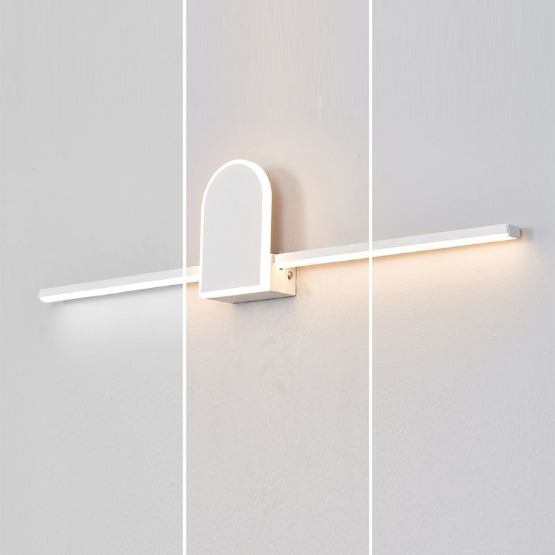 Edge Modern Vanity Wall Light illuminating bathroom