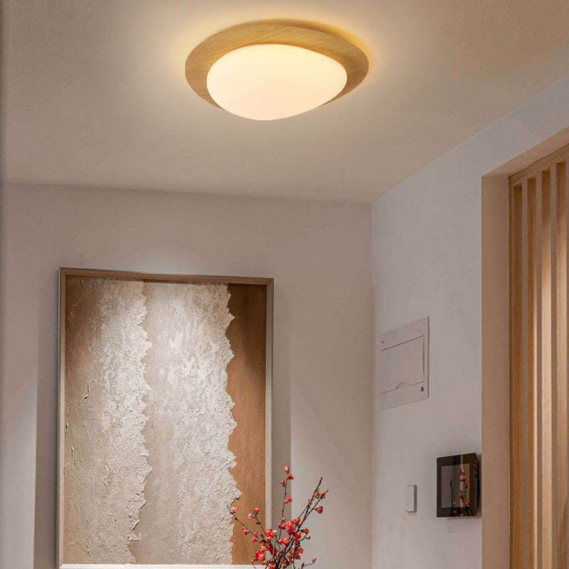 Quinn Flush Mount Ceiling Light illuminating a modern living space