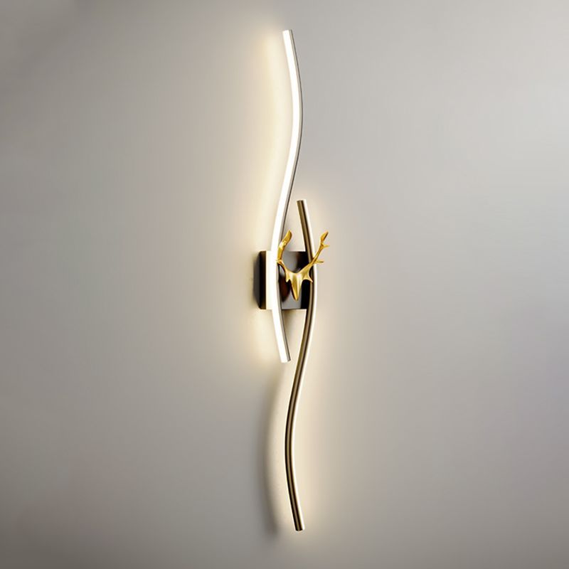 Alana gold LED wall lamp with deer. Modern vanity lighting