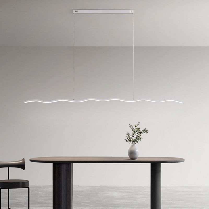 Louise Wave Pendant Light above a dining table