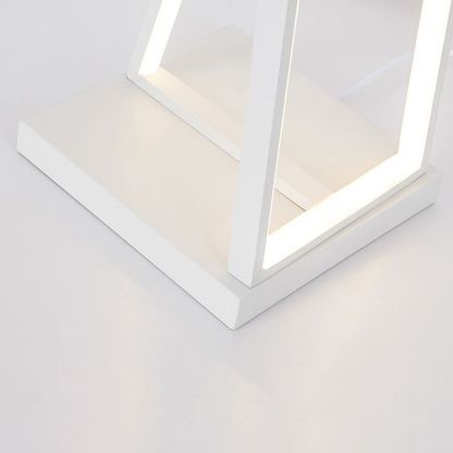 Close-up of white Edge Linear Triangle Floor Lamp base.