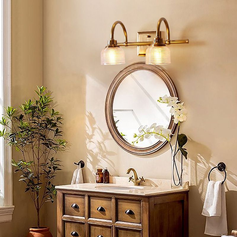 Lottie Prismatic vanity wall lamp in bathroom setting