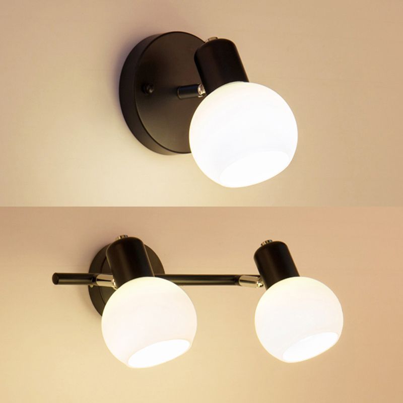 Valentina Wall Lamp: Spherical glass and black metal fixtures