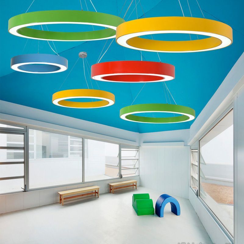 Colorful Morandi O Shape Pendant Lights in a Playroom