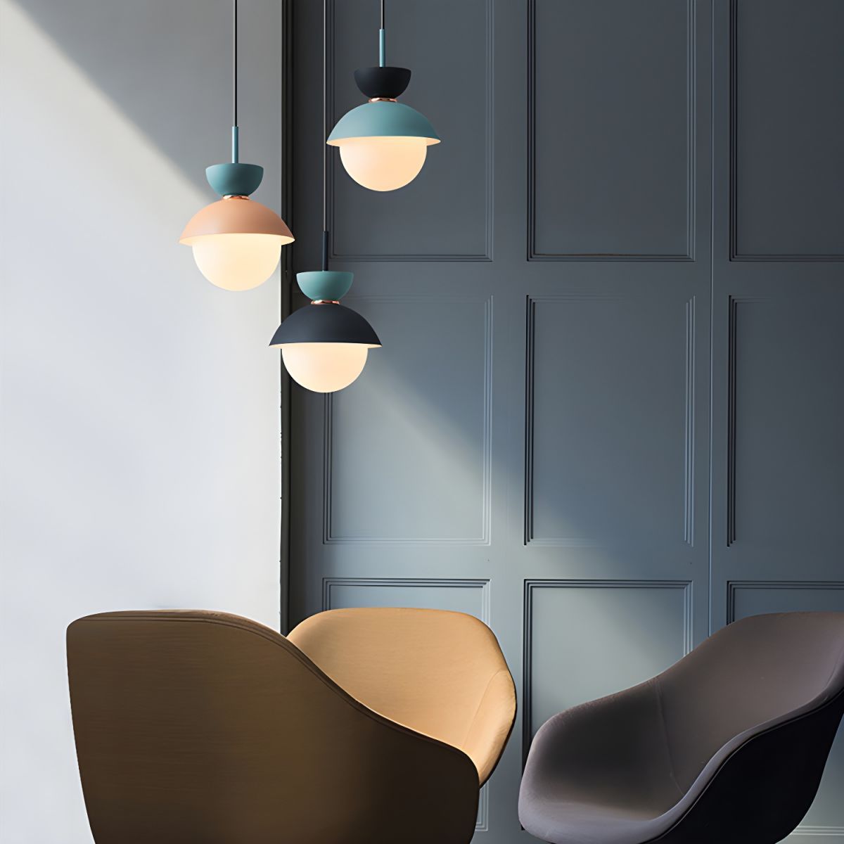Cairns Nordic Pendant Lights over chairs