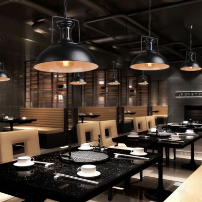 Restaurant lighting with Alessio vintage black pendant lights.
