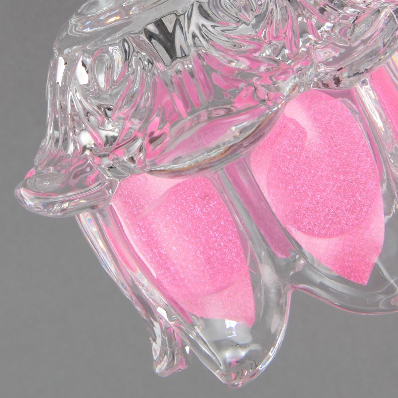 Close-up of Félicie pink flower vanity wall lamp.