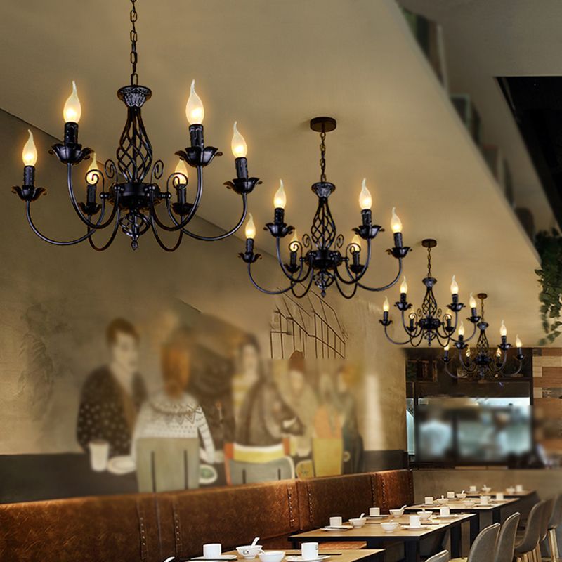 Black candle pendant lights in a restaurant