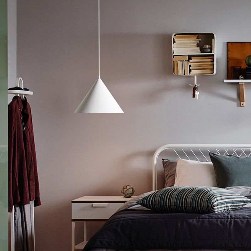Morandi funnel pendant light in modern bedroom. Artistic lighting solutions.