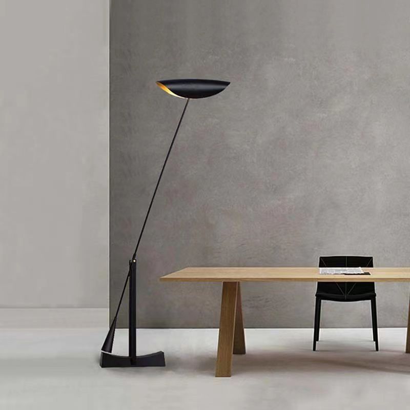 Modern black bowl floor lamp in dining room setting