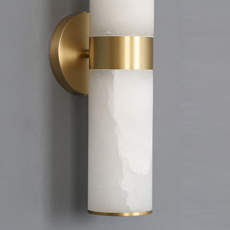 Modern brass and stone wall sconce, close up