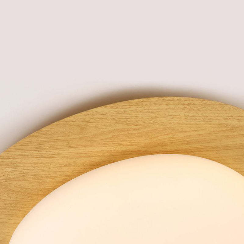 Close-up of Quinn Flush Mount Ceiling Light, wood trim